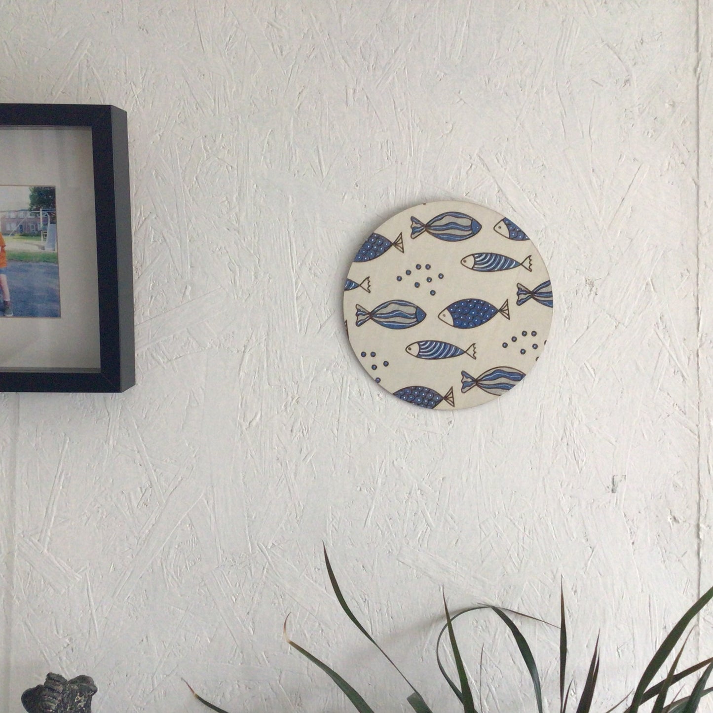 Houten muurcirkel- vispatroon